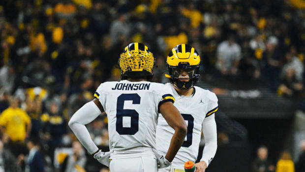 JJ McCarthy, Cornelius Johnson